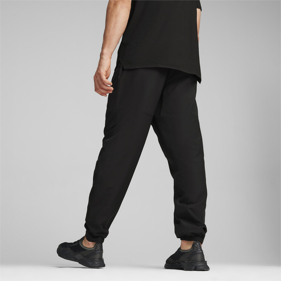 Штани Puma Porsche Woven Tech Pants (62110520) - фото