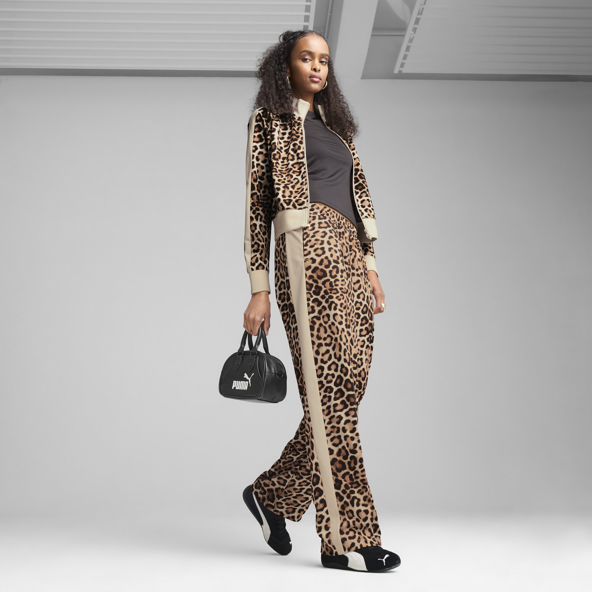 Штани Puma T7 Leo Luxe All-Over Print Straight (63234387) - фото