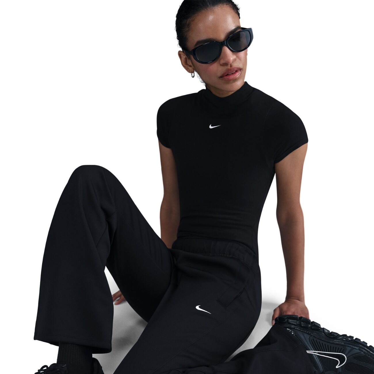 Штани Nike Sportswear Windrunner Mid-Rise Slim Knit (HJ1016010) - фото